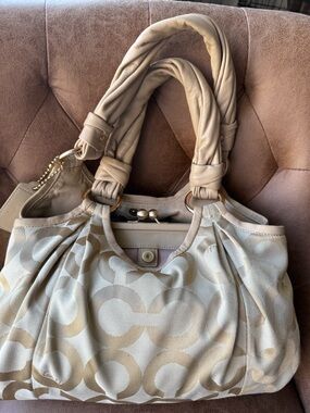 Coach jacquard kiss lock bag